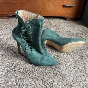 Green high heeled boots